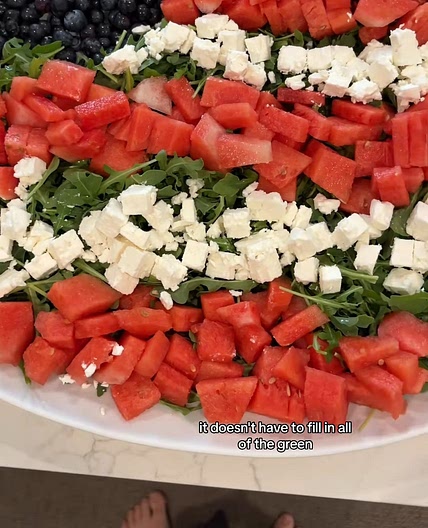 Kale, blueberry, strawberry, and feta salad