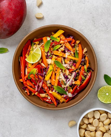 Tropical macadamia mango slaw