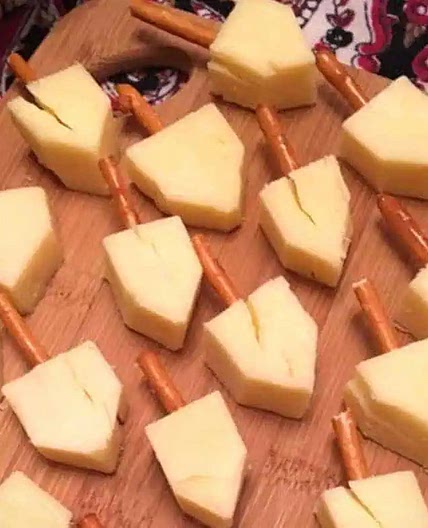 Cheese and pretzel dreidels