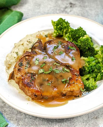 Smothered Pork Chops with Broccoli, Mushrooms and Mashed Potatoes