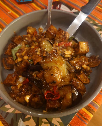 Stir-fried aubergines with tofu, cashew nuts and Thai basil