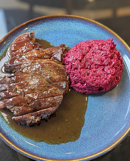 Rump steak and red wine sauce with beetroot and walnut salad