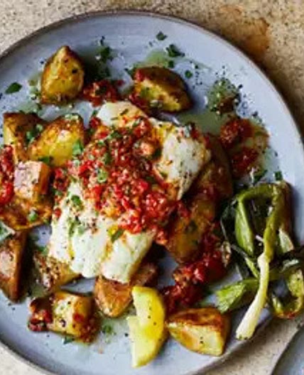 Hake with roast red pepper sauce & charred salad onions