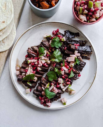 Pomegranate marinaded skirt steak