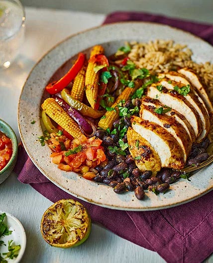Fajita chicken rice bowl with burnt lime