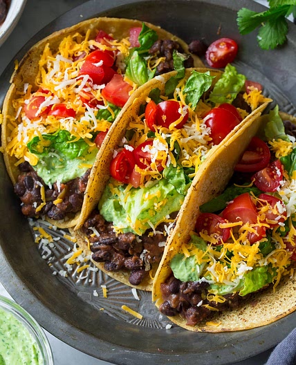 Black Bean Tacos {with Avocado Cilantro Lime Crema}