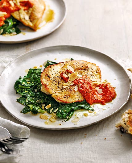 Chicken with smoky romesco sauce and garlicky greens