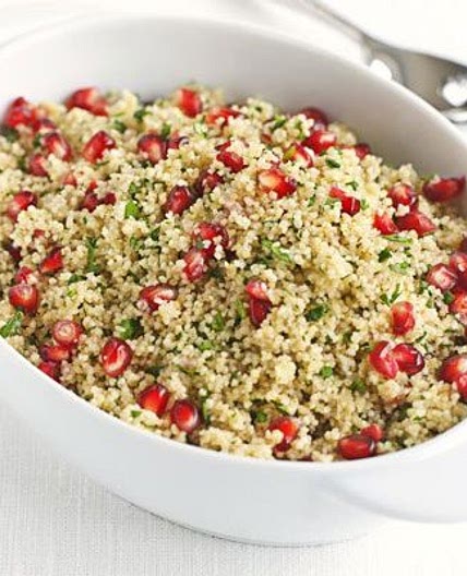 Herby couscous with citrus & pomegranate dressing