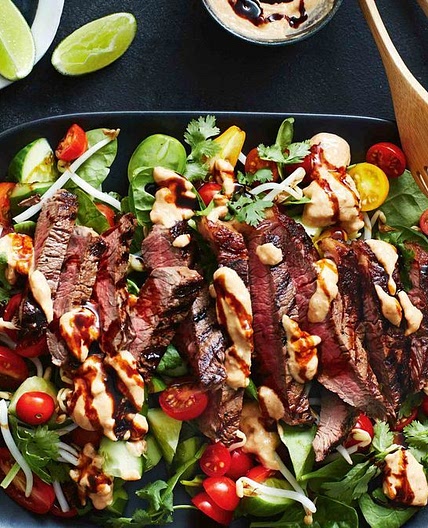 Beef steak with satay sauce and sprout salad