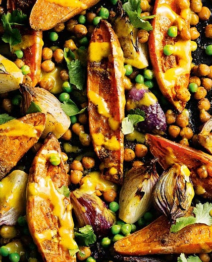 Spicy sweet potato and chickpea bake with lime tahini dressing