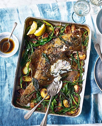 Whole roast plaice with anchovy and sage butter, new potatoes and sea vegetables