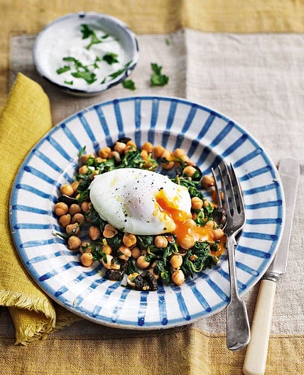 Poached eggs with harissa chickpeas and garlic yogurt