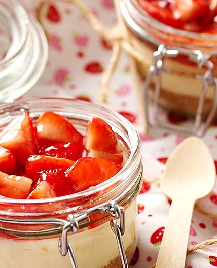 Individual strawberry and cream cheesecakes