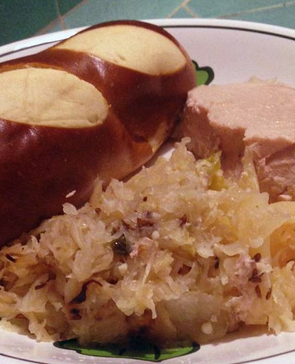 Slow Cooker German-Style Pork Roast with Sauerkraut and Potatoes