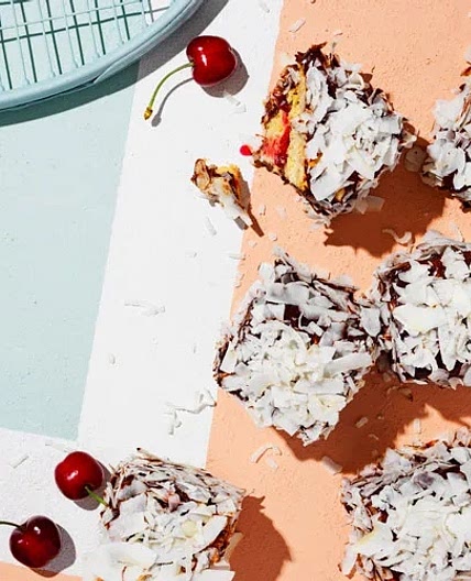 Coconut lamingtons with cherry jam