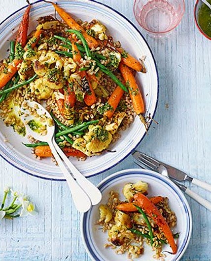 Roasted new carrots, cauliflower, grains & carrot-top dressing