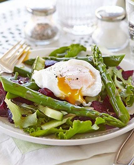 Asparagus salad with a runny poached egg