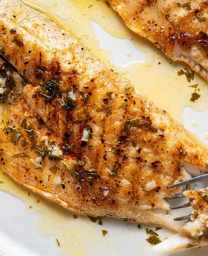 Grilled Sea Bass With Garlic Butter