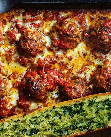 Oven-roasted chorizo meatballs with tomato ragu and herby garlic bread
