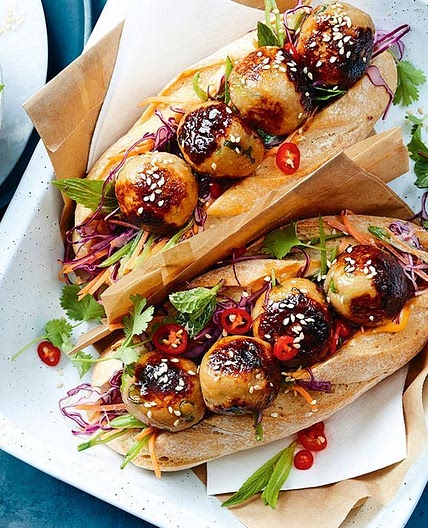 Honey-glazed miso chicken meatball subs with rainbow slaw