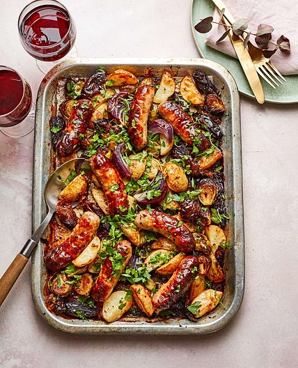 Sticky date and sausage traybake