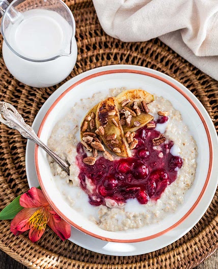 Christmas Oats Porridge with Cranberry Sauce, Apples and Pecans
