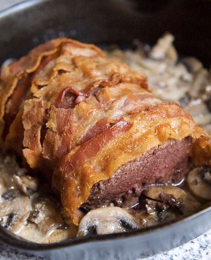Bacon-Wrapped Venison Tenderloin with Garlic Cream Sauce