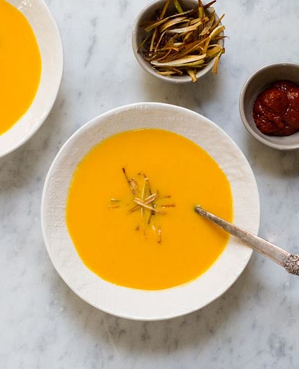 Carrot-Coconut Soup with Harissa and Crispy Leeks