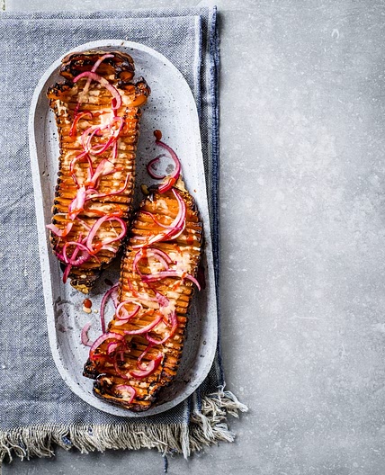 Glazed hasselback squash with sesame-honey-sriracha