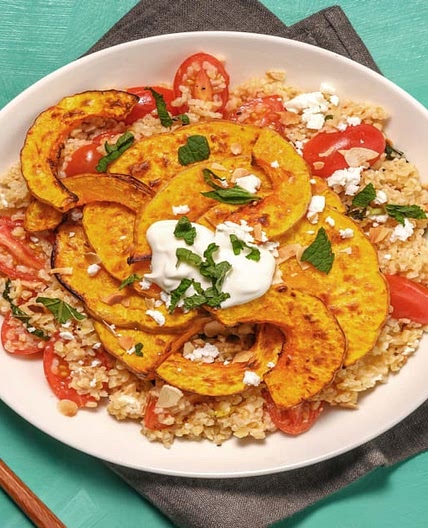 Harissa Roasted Sweet Potato on Mint Tabbouleh with Cheese, Flaked Almonds and Yoghurt