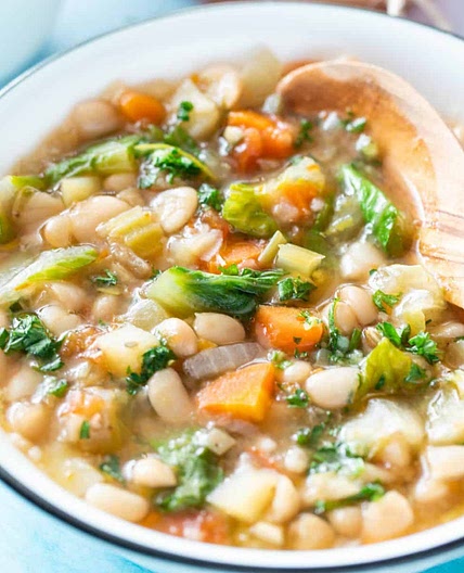 Creamy white bean soup with escarole and gremolata