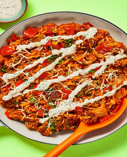 One-Pan Cajun Pork Sausage Skillet with Dirty Rice & Parsley Crema