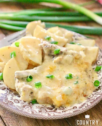 CROCK POT SMOTHERED PORK CHOPS AND POTATOES