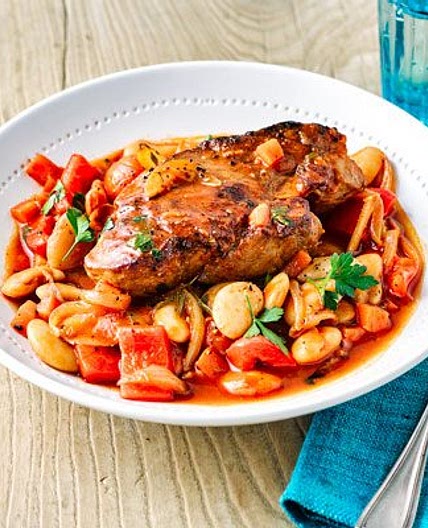 Spanish pork shoulder steaks with beans