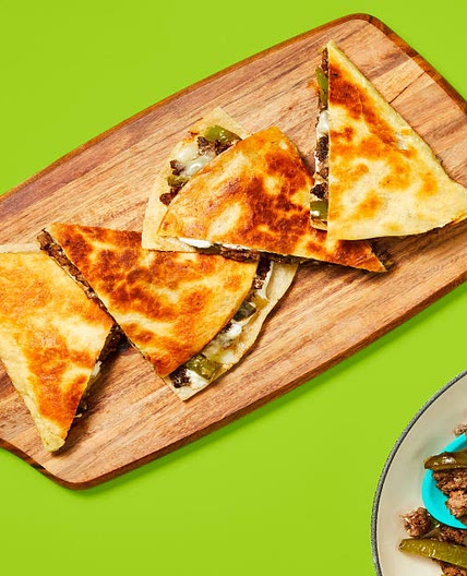 One-Pan Cheesy Beef Tortilla Melts with Green Bell Pepper & Spicy Cream Sauce