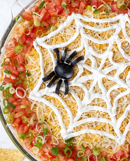 Spooky 7 Layer Halloween Spiderweb Taco Dip