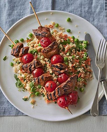 Spiced lamb kebabs with pea & herb couscous