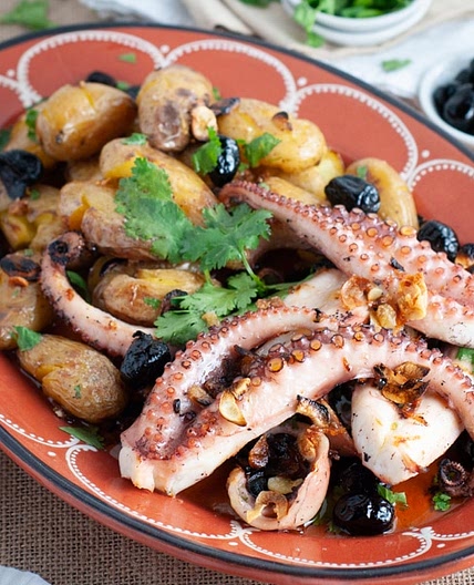 Portuguese style grilled octopus with smashed potatoes (polvo à lagareiro)