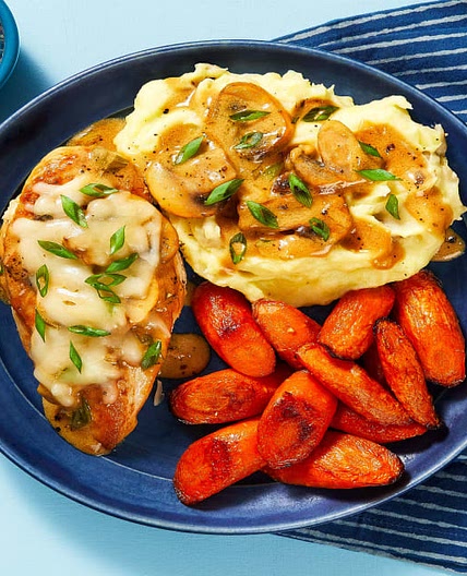 Cheesy Smothered Mushroom Chicken with Mashed Potatoes & Roasted Carrots
