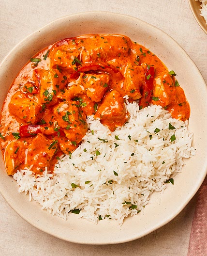 Creamy turkey and bell pepper over rice