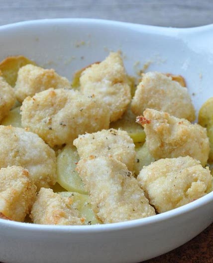 Bocconcini di pollo con sfogliette di patate al forno
