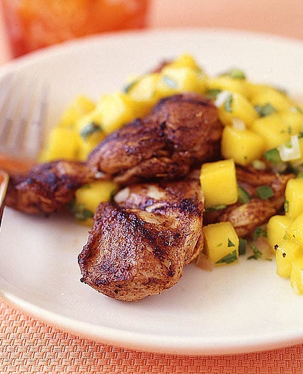 Jerk chicken thighs with mango salsa