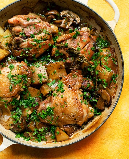 Chicken thighs with mushrooms and cider