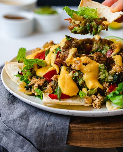 Loaded Spiced Tofu Nachos with Peppers and 'Cheese' Sauce