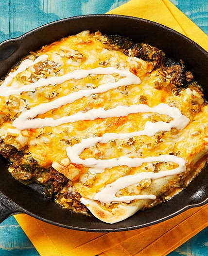 One-Pan Beef Enchiladas Verdes with Mexican Cheese Blend & Hot Sauce Crema