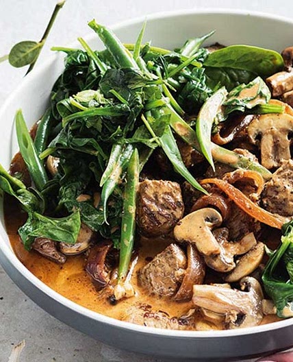Beef and mushroom stroganoff with garlic spinach and beans
