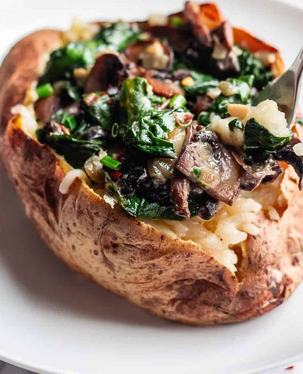 Healthy Vegan Baked Potato Loaded With Mushrooms And Cheese