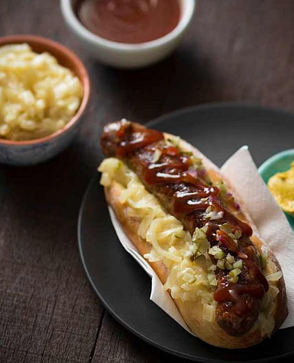 Sausage sizzle with beer braised onions