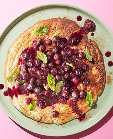 Banana & cinnamon pancakes with blueberry compote