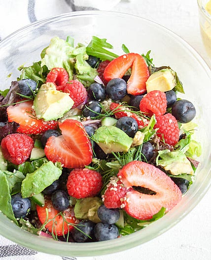 Avocado and Berry Salad with Turmeric Tahini Dressing